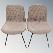 A pair of Danish Asger Soelberg design fabric upholstered chairs on metal legs.