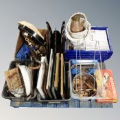 A pallet containing a crate of CDs, pictures, magazine rack, kitchen ware, brass light fitting,