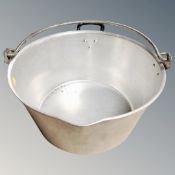 An aluminium jam pan.