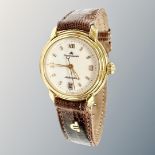 A lady's Maurice Lacroix gold plated and stainless steel automatic calendar wristwatch, case 26mm.