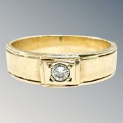 A gent's yellow gold diamond-band ring, size X½.