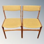 A pair of 20th century Erik Buch design teak dining chairs.