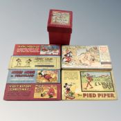 A group of boxed Disney lantern slides and a boxed Progress Gyroscope spinning top.