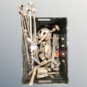A crate containing a quantity of vintage hand tools, blow lamp, braces, drill pieces.