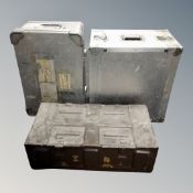 A metal ammunition crate together with two further metal crates.