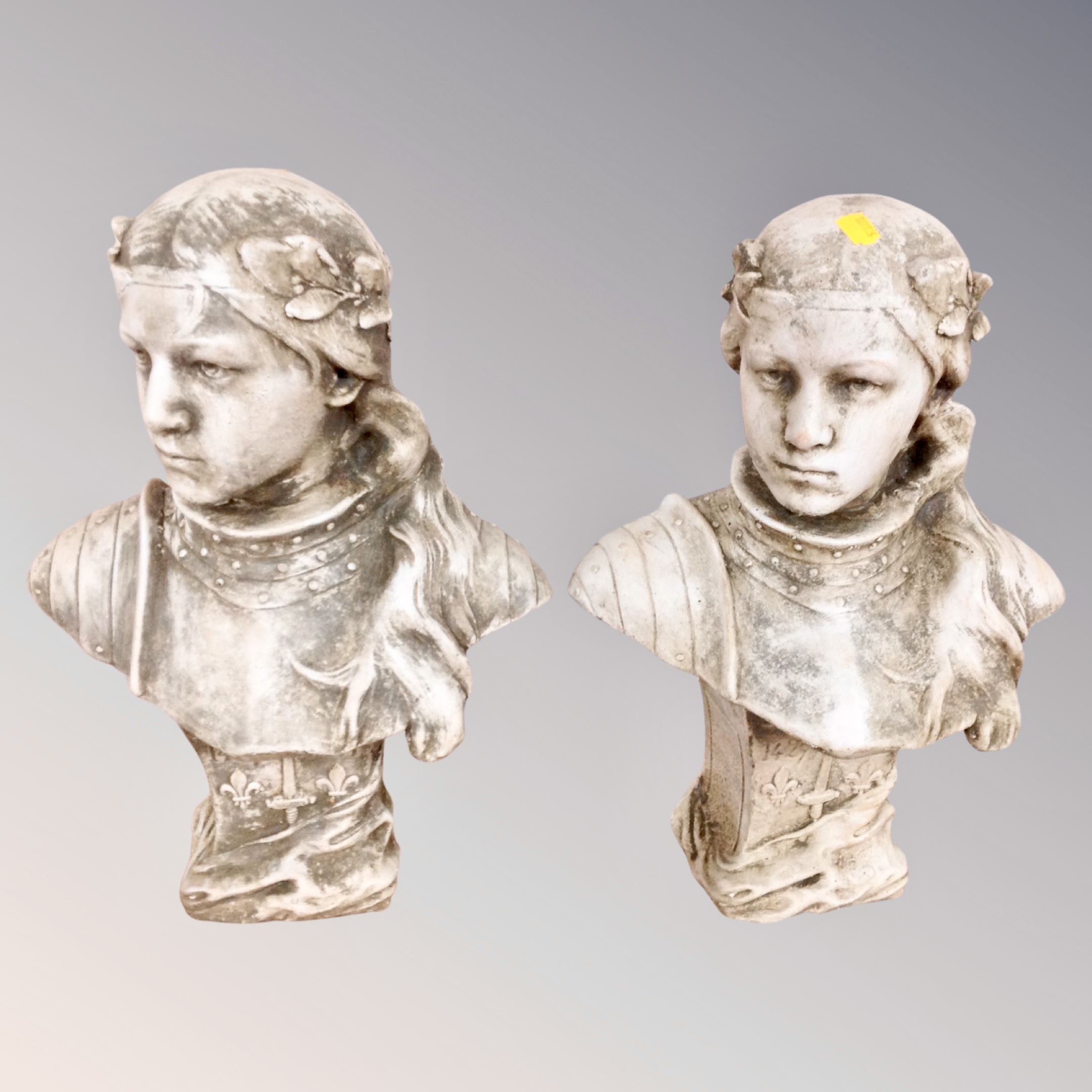 A pair of composition busts of Joan of Arc, height 41 cm.