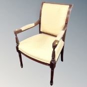 A Regency style mahogany open armchair.