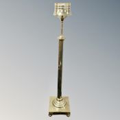 An early 20th century brass oil lamp stand,