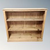 A set of pine open bookshelves,