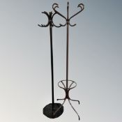 Two metal hat and coat stands.