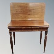 A 19th century Scandinavian mahogany turnover top tea table on fluted legs (af),