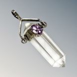 A silver crystal and amethyst pendant