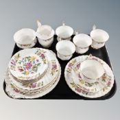 A tray containing a twenty piece Royal Cauldon Ludlow bone china tea service.