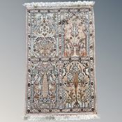 A Ghom silk-piled rug, Central Iran,