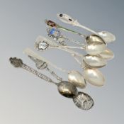 Nine assorted silver and enamel spoons.