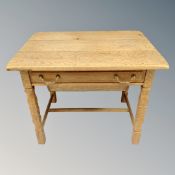 A Danish blonde oak work table fitted a drawer.