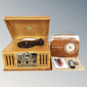 A Steepletone retro style music centre with instructions and remote together with a retro Bush