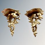 A miniature pair of gilt wood and gesso wall brackets, height 11cm.