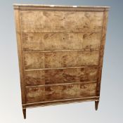 An early 20th century Scandinavian beech five drawer chest,