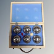 A cased set of French boules.