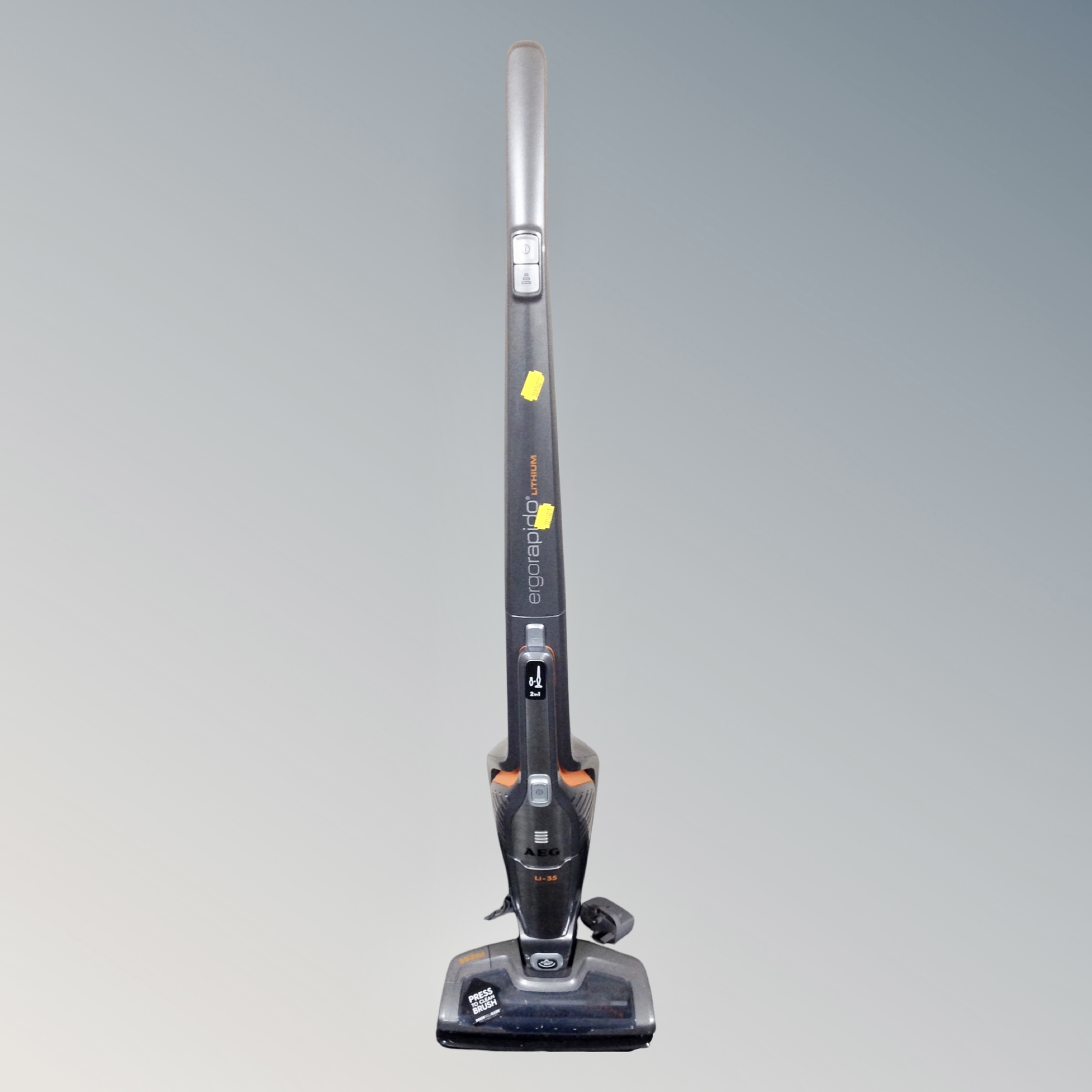 An AEG LI-35 Ergorapdo lithium two in one upright cordless electric vacuum together with two