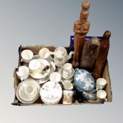 A box containing antique and later teaware, commemorative mug, carved wooden figures etc.