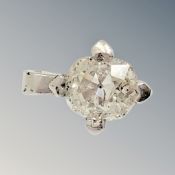 A platinum diamond pendant, the old cut stone weighing approximately 0.