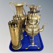 An ornate brass spirit kettle, pair of trench art vases, two ewers.