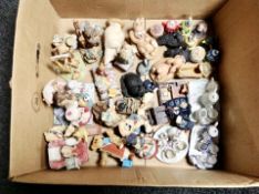 A box containing miniature ceramic tea services, ornaments to include Peter Fagan teddy bears etc.
