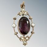 An Edwardian amethyst and seed pearl pendant CONDITION REPORT: Apparently unmarked.