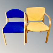 A beechwood open office armchair upholstered in mustard fabric together with a further upholstered