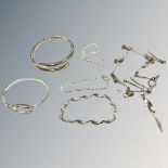 Two silver bangles, two bracelets and a necklace with several broken links.