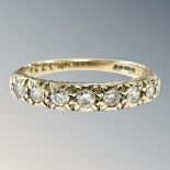 A 9ct yellow gold seven stone diamond half eternity ring, size P, 2.7g.