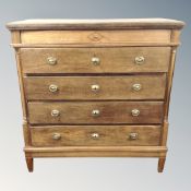 A 19th century inlaid oak five drawer chest on rasied legs,