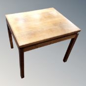 A 20th century Danish square occasional table.
