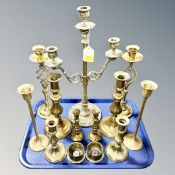 A tray containing six pairs of antique and later brass candlesticks together with a further