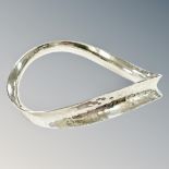 A hammered silver bangle CONDITION REPORT: 18.