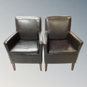 A pair of contemporary brown leather upholstered armchairs.