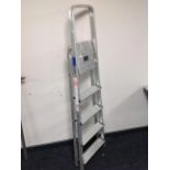 A folding aluminium five tread step ladder