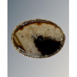 A large antique hardstone brooch in yellow metal mount, width 7.5cm.