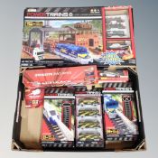 A Power trains train set with accessories together with a Shell V-power track with car and battery,