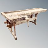 A vintage Scandinavian woodworking bench fitted with two vice,