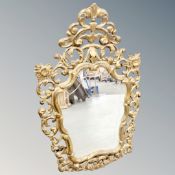 A vintage gilt framed baroque style wall mirror