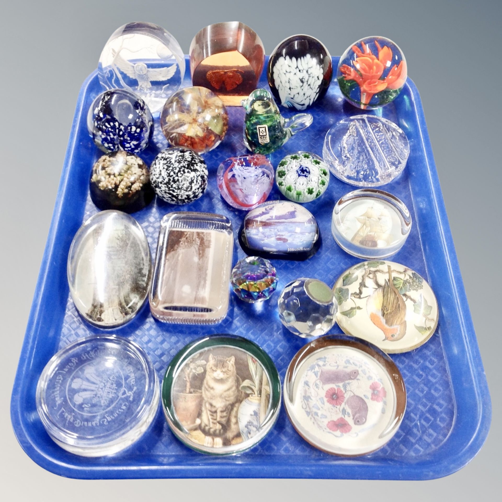 A tray of glass crystal and perspex paperweights,