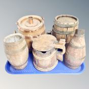 A tray of five oak jugs,