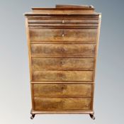 A 19th century Danish mahogany seven drawer chest on chest