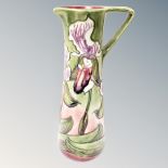 A Moorcroft Orchid design ewer, height 24 cm, limited edition 65/250,