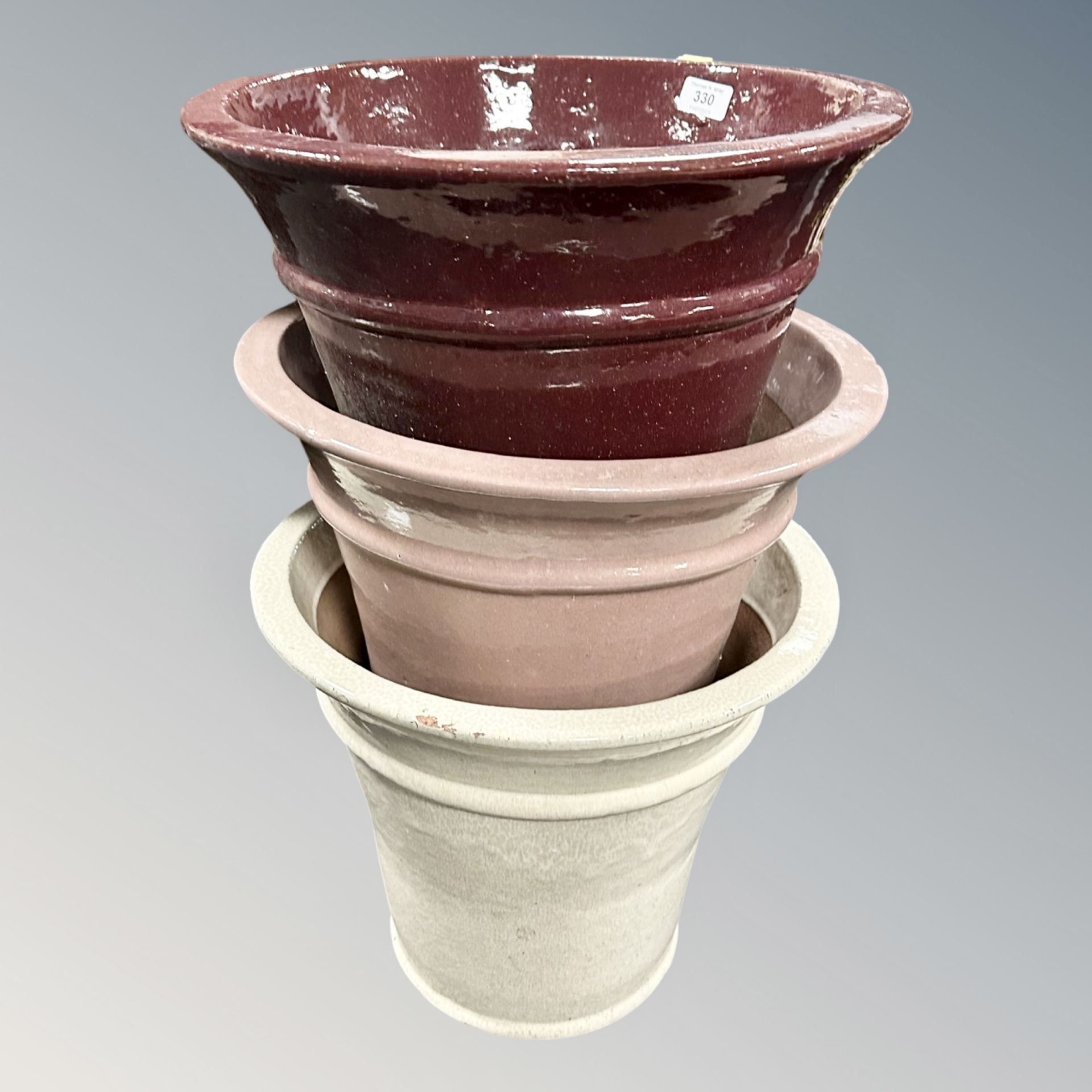 Three glazed pottery plant pots