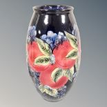 A Moocroft style vase, bears printed signature,