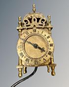 A Smiths miniature lantern clock, with electric Smiths movement, height 16.5 cm.